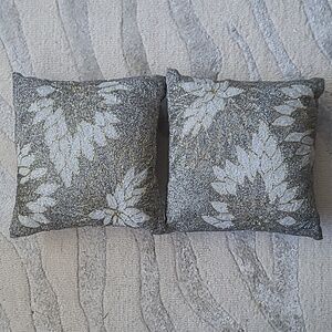 Two Pointsetta Beaded Pillows